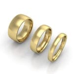 Barrel-shaped wedding ring - yellow gold