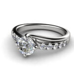 Round diamond with side stones engagement ring in platinum - zenais