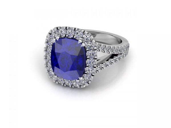 White gold sapphire ring with a halo of diamonds and a split band - danae