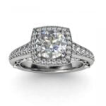 Platinum cushion halo with a round diamond engagement ring - ira Platinum cushion halo with a round diamond engagement ring - ira