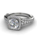 White gold cushion halo with a round diamond engagement ring - ira White gold cushion halo with a round diamond engagement ring - ira