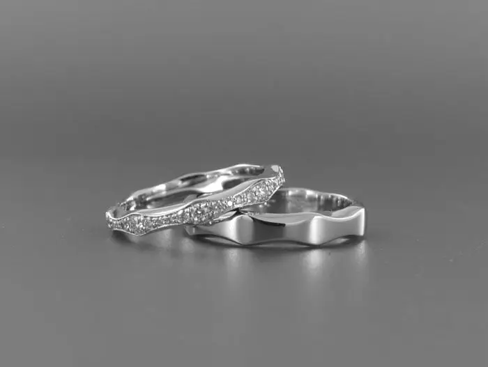 Custom jewellery designs 3 His and hers wedding rings in platinum